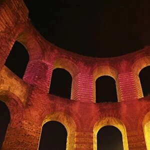 Ruins of Roman baths illuminated at night, Kaiserthermen (Imperial Baths), Trier, Rhineland-Palatinate, Germany, august