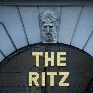 Sign above hotel arcade entrance, The Ritz Hotel, Piccadilly, London, England, april
