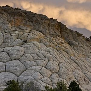 Spectacular cross-bedded Navajo sandstone rock (fossilised sand dunes) at sunset, near Boulder