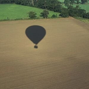 Sports & Pastimes Balloning - Shadow of balloon over farmland
