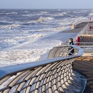 Stormy sea and promenade in seaside resort town, Blackpool, Lancashire, England, January
