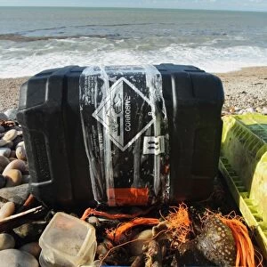 Toxic drum washed up on beach, Chesil Beach, Dorset, England, November