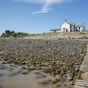 View of causeway and 18th century public house near coast, The Ship Inn, Piel Channel, Piel Island, Islands of Furness