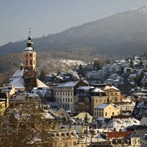 View of church and spa town in snow, with summit of Merkur Mountain in background, Stiftskirche, Baden-Baden