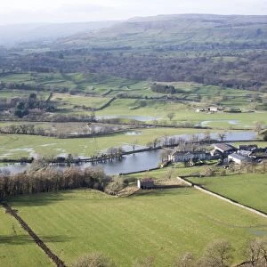 View of floodwater on valley farmland, looking up Wensleydale from above West Burton, North Yorkshire, England
