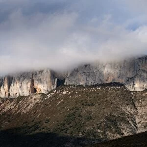 View of low cloud over mountain cliffs, near Trem, Pyrenees, Catalonia, Spain, november