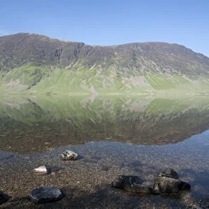 View of mountains reflected in lake, Mellbreak, Crummock Water, Lake District N. P. Cumbria, England, June