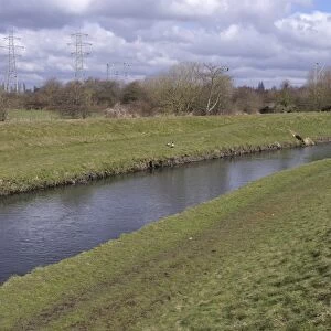 View of river and riverbanks, River Tame, Sandwell Valley RSPB Reserve, West Midlands, England, April