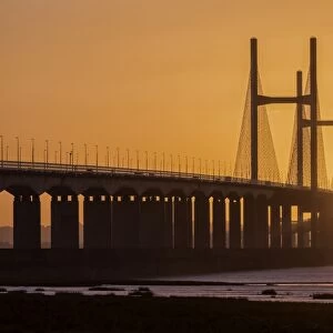 View of road bridge over river at sunrise, viewed from Caldicot, Second Severn Crossing, River Severn, Severn Estuary