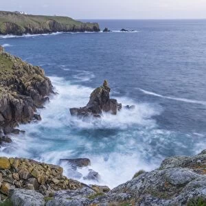 View of rocky coastline, looking towards Lands End from watchtower, Sennen Cove, Sennen, Cornwall, England, May