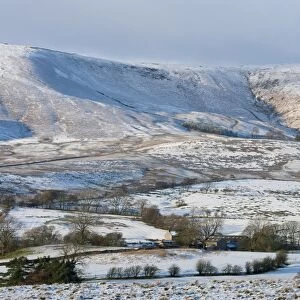 View of snow covered farmland and fell, looking towards Whitmore Fell from Long Knots over Higher Fence Wood, Whitewell, Lancashire, England, december