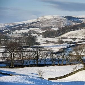 View of snow covered farmland and hills, Upper Wensleydale, North Yorkshire, England, December