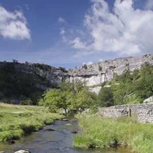 View of stream and limestone cliff, Malham Cove, Malhamdale, Yorkshire Dales N. P. North Yorkshire, England, august