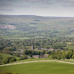 View across town towards farmland and distant moorland, Kirkby Stephen, Eden Valley, Cumbria, England, June