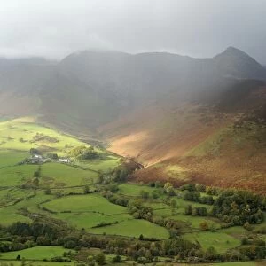View of valley and fell with rain squall overhead, looking from Catbells, Causey Pike, Newlands Valley