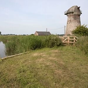 View of windpump and pumphouse at edge of waterway, Clippesby Mill, Ashby with Oby, River Bure, The Broads N. P