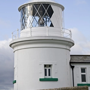 White painted lighthouse on coast, Anvil Point Lighthouse, Durlston, Isle of Purbeck, Dorset, England, january