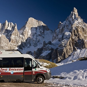 Zero emission hydrogen fuel cell vehicle parked below mountain peak, Cimon della Pala, Pale di San Martino, Dolomites