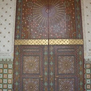 Africa, Morocco, Casablanca. Royal Palace, ornate wooden harem doors surrounded by