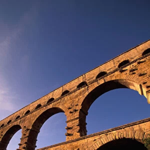 EU, France, Provence, Gard, Pont du Gard. Roman aqueduct / bridge in sunset light