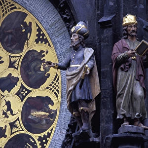 Europe, Czech Republic, Prague. Two figures next to the Old Town Clock Tower Calendar