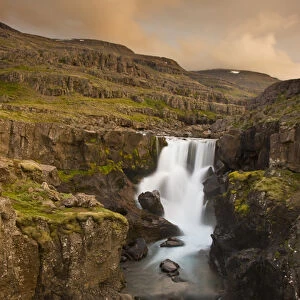 Europe, Iceland. Waterfall in Berufjordur Fjord. Credit as: Don Grall / Jaynes Gallery