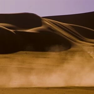 Libya, Fezzan, car among the dunes of the Erg Murzuq