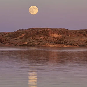 Full moonrise over Fort Peck Reservoir in the Charles M Russell National Wildlife