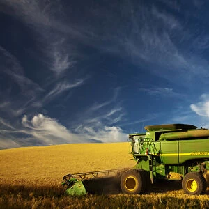 North America; Washington; Palouse Country; Combine Harvesting Wheat