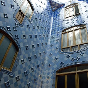 Spain, Catalonia, Barcelona. Gaudis Casa Batllo (1906). Blue tiled interior