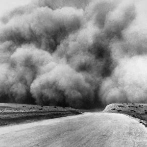 DUST BOWL, 1935. A dust storm in Oklahoma. Photograph, 1935