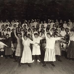 HINE: WOMANs UNION, 1916. Members of the Happy Girls Club performing a routine with hand weights