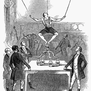 LONDON: JUGGLER, 1846. A juggler performing at Astleys Theatre, London, England. Wood engraving from an English newspaper, 1846