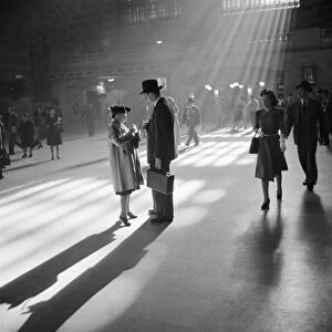 Passengers at Grand Central Terminal in New York City. Photograph by John Collier, 1941