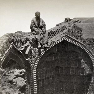 SAMARKAND: MAUSOLEUM RUINS. Man seated on the ruins of a mausoleum in Samarkand
