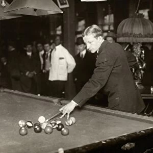 THOMAS HUESTON, 1921. The veteran billiard player, Thomas Hueston, returning to the game