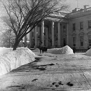 WHITE HOUSE IN SNOW, 1903. The White House in Washington, D. C. after a heavy snow