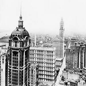 WOOLWORTH BUILDING, 1916. The Singer and Woolworth Buildings, New York City. Photograph