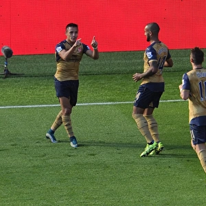 Alexis Sanchez celebrates scoring his 2nd goal, Arsenals 3rd, with Theo Walcott