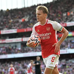 Arsenal's Martin Odegaard Faces Off Against Tottenham in the 2023-24 Premier League Clash at Emirates Stadium