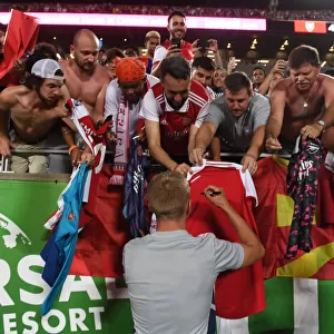 Arsenal's Zinchenko Signs Autographs After Arsenal v Chelsea Florida Cup Match