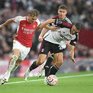 Martin Odegaard vs. Joao Palhinha: A Premier League Battle at Emirates Stadium