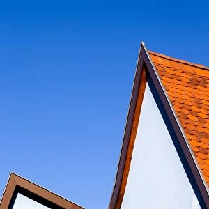 The roofline of a house in Gertwiller, France