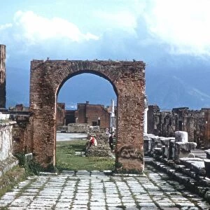 Ancient Rome: Pompeii. Arch and paved walkway. 1st century AD
