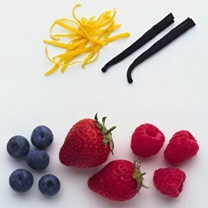 Blueberries, strawberries, raspberries vanilla pods and lemon rind