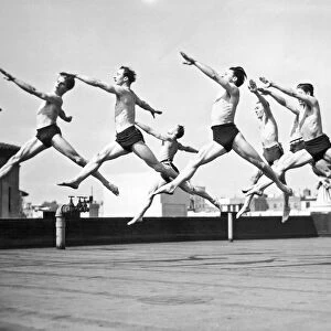 Dancers Practice On A Rooftop