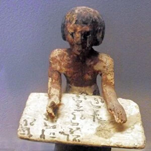Egyptian tomb figure depicting a scribe