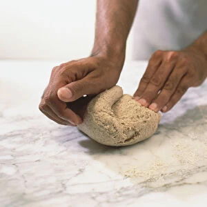 Folding Chapati bread dough