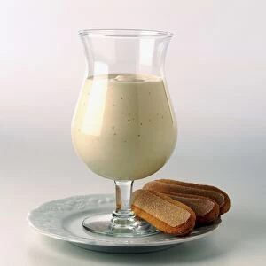 Glass of Zabaglione served with sponge fingers