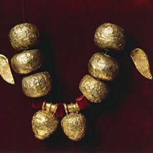 Gold necklace with Etruscan pendants
